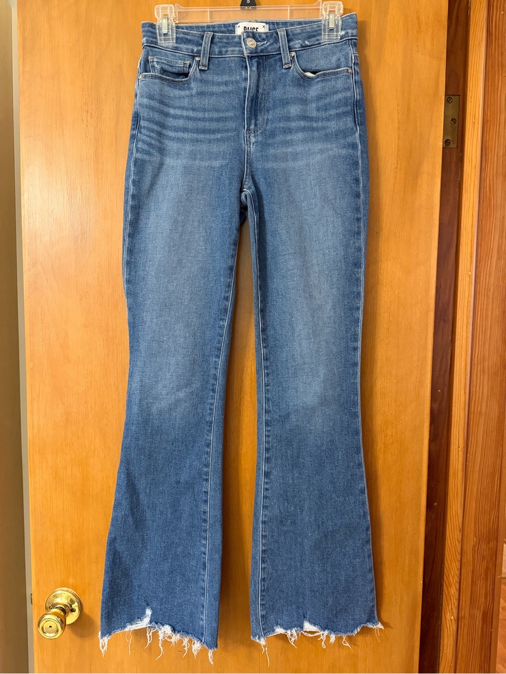 PAIGE Medium Blue Flare Jeans with Raw Hem Laurel Canyon